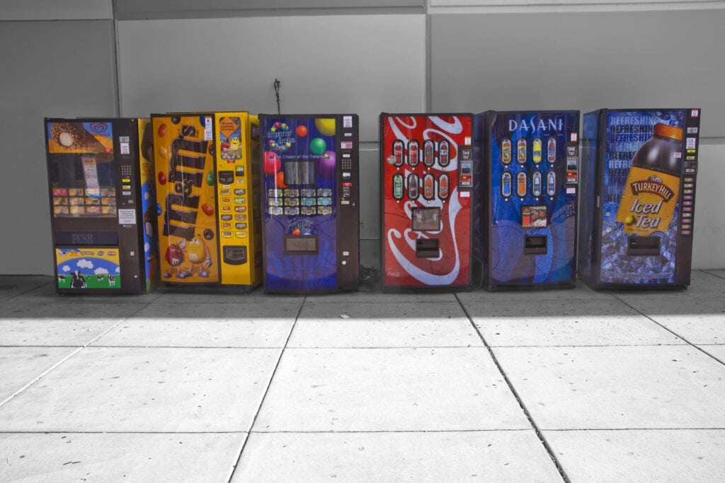 picture of vending machines for soda and candy for an article about low effort side hustles that actually work