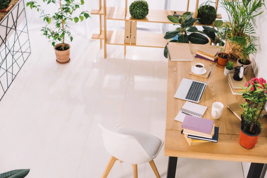 picture of office and laptop on a desk for the article best freelance sites